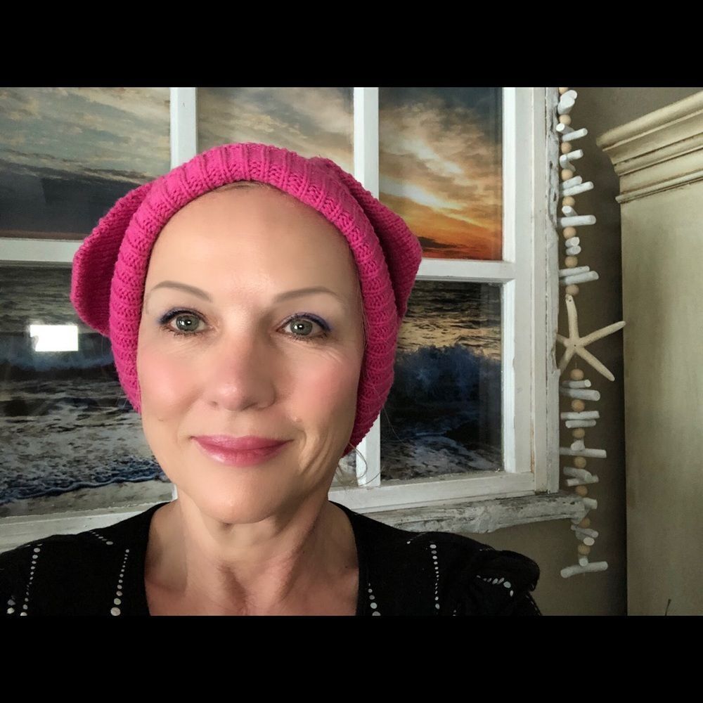 Nice knitted pink hat by POP headwear